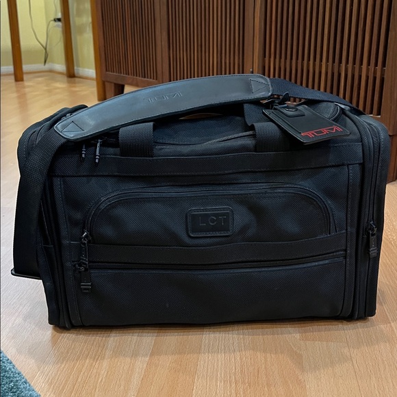 Tumi black Travel Bag. Gently used